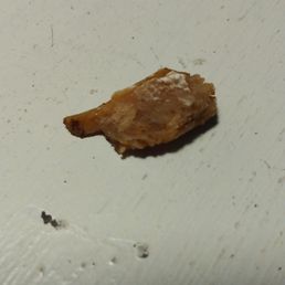 a piece of food on a table a piece of food on a table