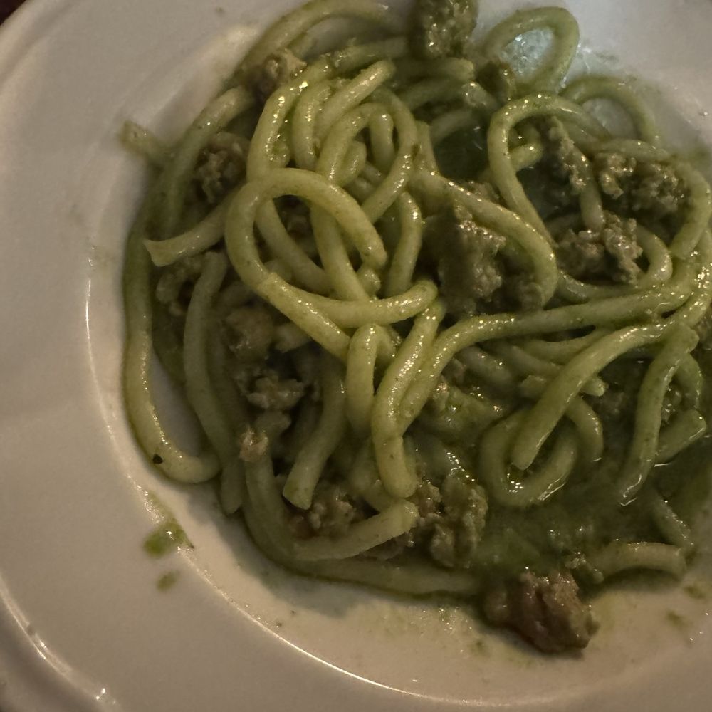 Pici with rocket pesto and sausage