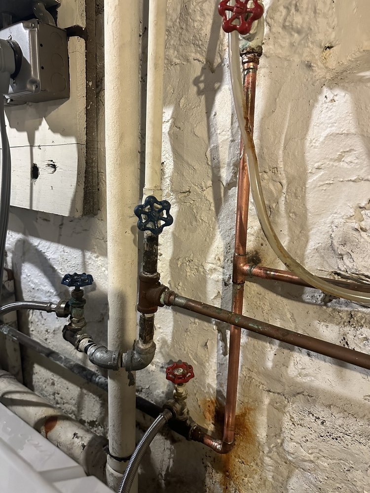 Slide of MP plumbing services