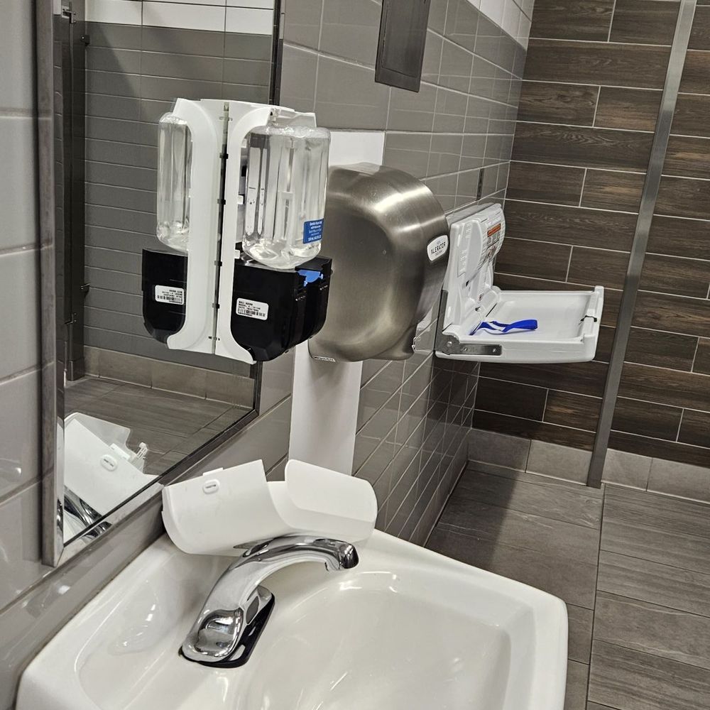 Broken soap dispensers Men Room Broken soap dispensers Men Room