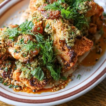 Bellwether Bar - Harissa Roasted Cauliflower- Tahini, Mint Olive Pistou, Pickled Sultanas, Spiced Cauliflower Seeds   Instagram.com/Maryelda - Bars Near Me - Portland, Oregon