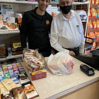 Imperial Kosher Market - Zach & Jacob at register - Grocery Near Me - Phoenix, Arizona