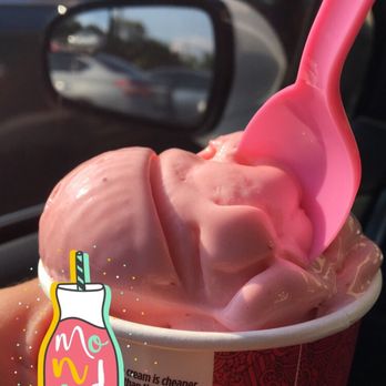 Smallcakes - a pink spoon sticking out of a cup of ice cream - Cupcakes Near Me - Mesquite, Texas