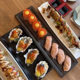 Top to bottom: Dragon Roll, sunrise, seared toro, oyster shooters, aloha roll Top to bottom: Dragon Roll, sunrise, seared toro, oyster shooters, aloha roll