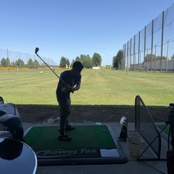Airport Golf Center - My buddy taking a swing.