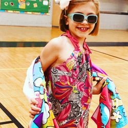 Fashion First Workshops - At Saint Vincent Martyr School in Madison this designer is showing off her beach cover-up. We run classes after school at SVMS on Tuesdays