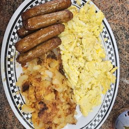 4 eggs with sausage (extra sausage) and home fries. Came with toast w/ cream cheese and a coffee included (before 11am) for $15.