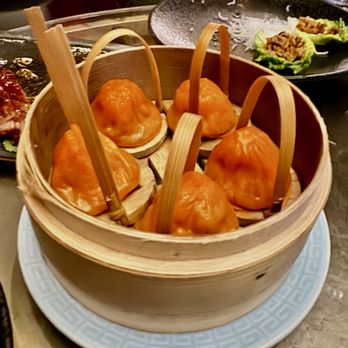 Mott 32 - Hot & Sour Iberico Pork Shanghainese Soup Dumplings - Chinese Near Me - Las Vegas, Nevada