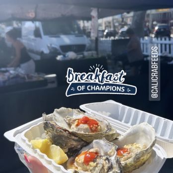 Cali Crab Feeds - Grilled Cali Oysters topped with tapatio, lemon , garlic & cocktail sauce mmmm - Caterers Near Me Cali Crab Feeds - Grilled Cali Oysters topped with tapatio, lemon , garlic & cocktail sauce mmmm - Caterers Near Me