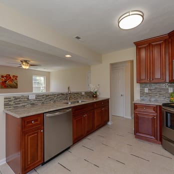 Global Home Decor - Cherry Cabinets and Desert Gold Granite by Global Home Decor. - General Contractors Near Me - Norfolk, Virginia