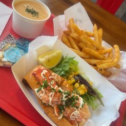 A premium Premium Style Lobster Roll, Lobster Bisque, French Fries A premium Premium Style Lobster Roll, Lobster Bisque, French Fries