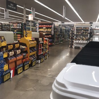 Safeway - a grocery store aisle with bins and bins - Grocery Near Me - Peoria, Arizona