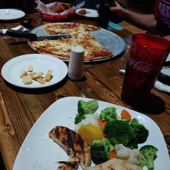 Old Lumber Company - Grilled chicken breast dinner (sans the wild rice) and bbq chicken pizza. - Bars Near Me - Vermillion, South Dakota Old Lumber Company - Grilled chicken breast dinner (sans the wild rice) and bbq chicken pizza. - Bars Near Me - Vermillion, South Dakota