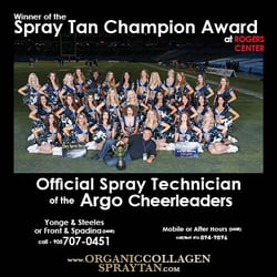 Real Tan - Here we are on the field at rogers center receiving the best spray tan/technician award