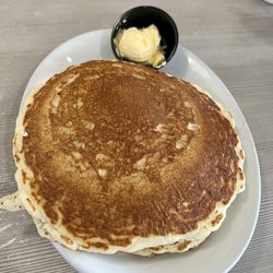 Perkins American Food - Side of pancakes. Very good buttermilk flavor and huge. Came with my omelette.