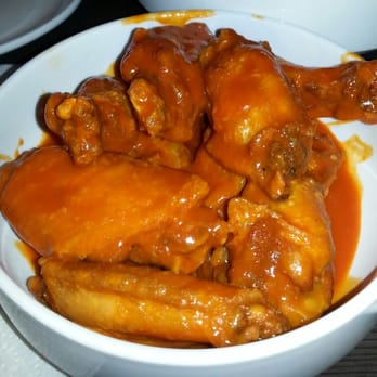 Wings and Rings - Traditional Wings. Buffalo hot. Extra Wet. - Chicken Wings Near Me - Piqua, Ohio