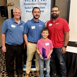 Ingram Insurance Group - This is Ingram Insurance receiving an award at an event hosted by Wayne Insurance Group.