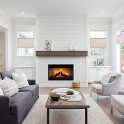 Budget Blinds of Mequon - Light-filtering shades create a cozy feel while preserving views--custom window treatments designed for comfort and balance.