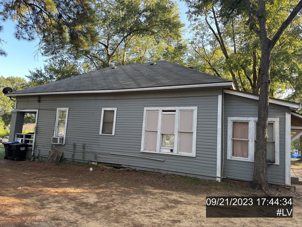 Slide of Busse Roofing