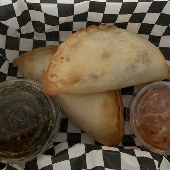 La Porteña - 1 spicy chicken and 1 spicy beef Empanada soo good - Pizza Near Me - Tustin, California