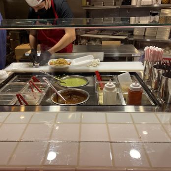 Chilangos Tacos - a chef preparing food - Tacos Near Me - Plano, Texas