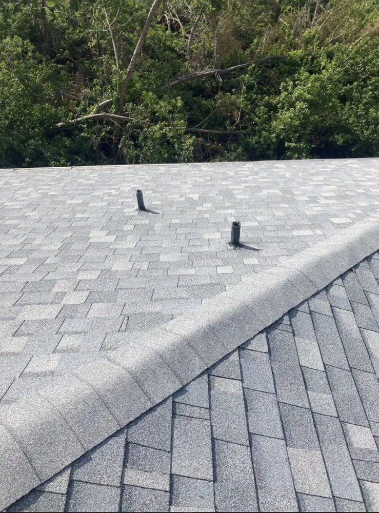 Slide of HP Storm Restoration - Roofing Company