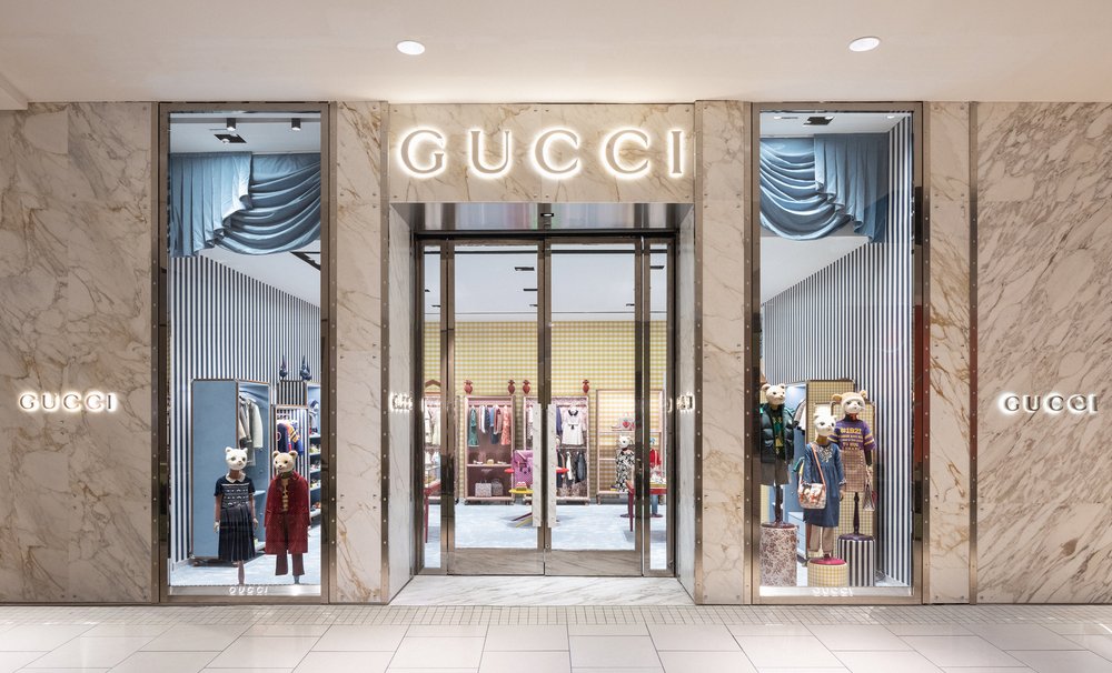 Gucci at Aventura Logo