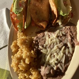 Crispy chicken tacos rice and beans