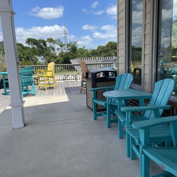 Front Porch Cafe - Outside seating in colorful Adirondack chairs - Coffee & Tea Near Me - Kill Devil Hills, North Carolina Front Porch Cafe - Outside seating in colorful Adirondack chairs - Coffee & Tea Near Me - Kill Devil Hills, North Carolina