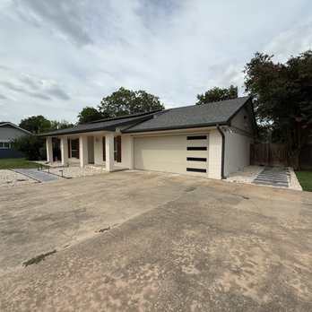 Elevate Overhead Doors - After: Converted two single garage doors in one double garage door. - Garage Door Services Near Me