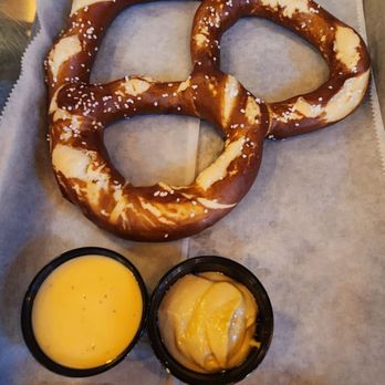 BaseLine Tap House - Oversized pretzel with warm cheese and spicy mustard - Lounges Near Me - Lake Buena Vista, Florida