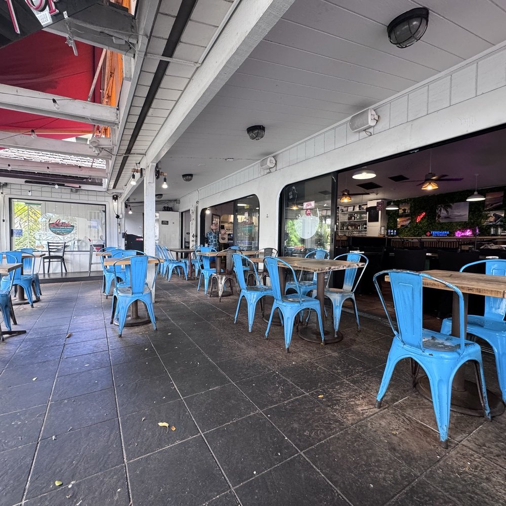 Happy Hour 3-6. Patio with an ocean view. This place is a vibe.