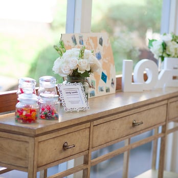 Malibu West Beach Club - we added a small candy station at the entrance with some decorations. table is from the venue. (By Andy Lu Wedding Photography) - Venues & Event Spaces Near Me - Malibu, California