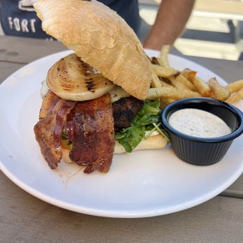 Thirsty Lion - Gastropub burger was good but not medium like we asked and too much stuff on it. - American Near Me - The Colony, Texas Thirsty Lion - Gastropub burger was good but not medium like we asked and too much stuff on it. - American Near Me - The Colony, Texas