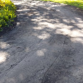 Pioneer Seal Coating & Asphalt Maintenance - Grinding away at rocks and crushed shells - Snow Removal Near Me - Millbury, Massachusetts Pioneer Seal Coating & Asphalt Maintenance - Grinding away at rocks and crushed shells - Snow Removal Near Me - Millbury, Massachusetts
