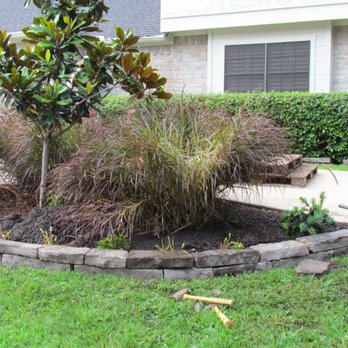 Solis and Son Landscaping - Applying grey chopped wister flagstone. - Landscaping Near Me - Houston, Texas Solis and Son Landscaping - Applying grey chopped wister flagstone. - Landscaping Near Me - Houston, Texas