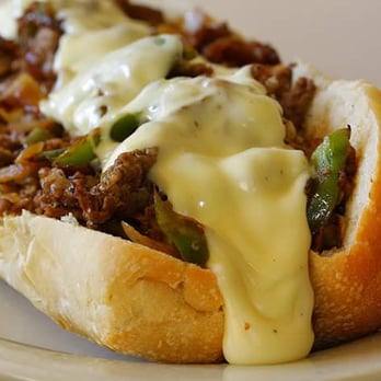 Wing Cafe - a chili dog with cheese on a bun - Cheesesteaks Near Me - Covington, Georgia Wing Cafe - a chili dog with cheese on a bun - Cheesesteaks Near Me - Covington, Georgia