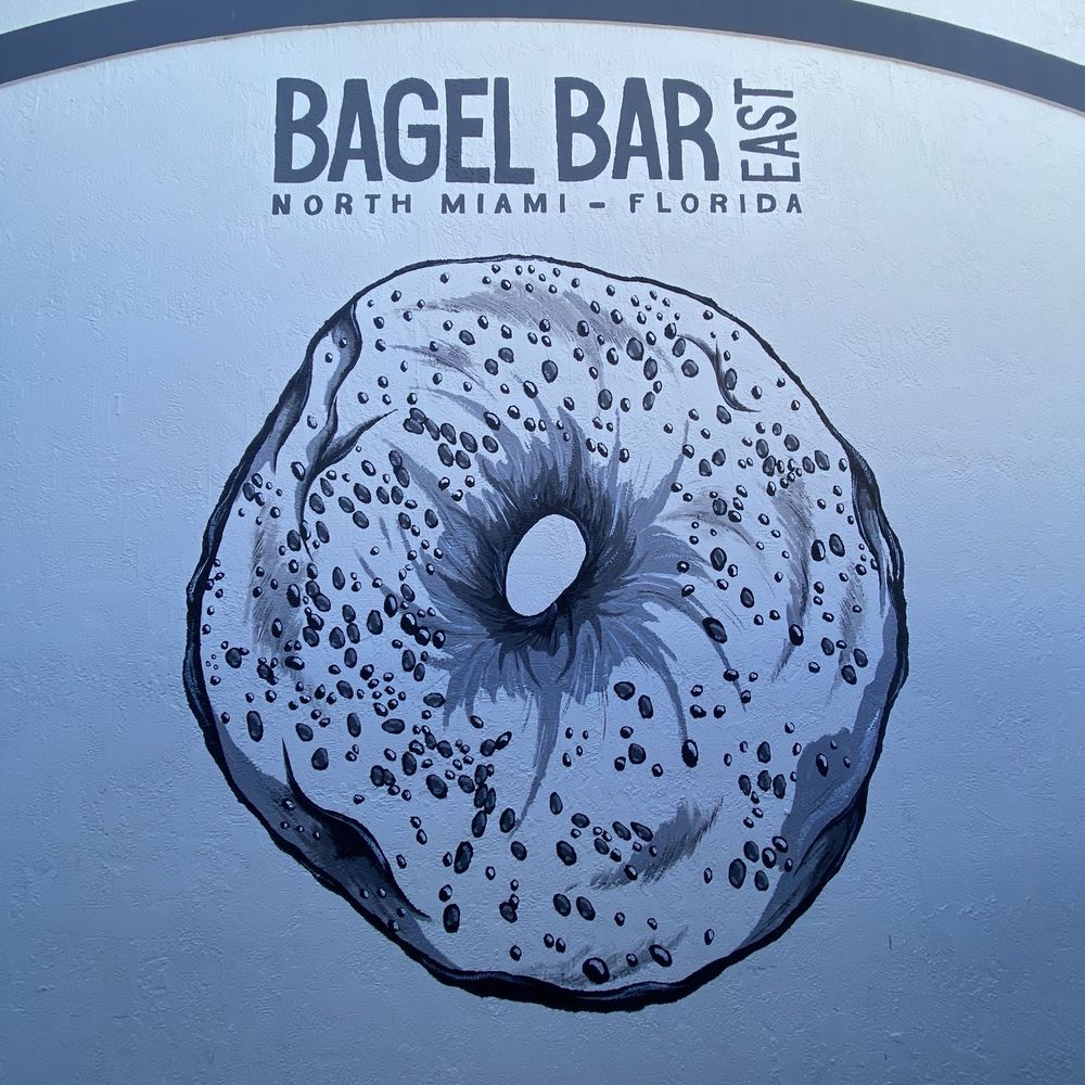 Bagel Bar East - On the wall outside - Bagels Near Me - North Miami, Florida Bagel Bar East - On the wall outside - Bagels Near Me - North Miami, Florida