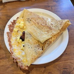 Village Crepe Haus - We ordered the egg crepe with bacon and cheese it was so delicious we left happy plates!