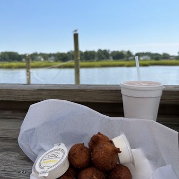 Waterfront Seafood Shack - Hush puppies with whipped honey - Seafood Near Me - Calabash, North Carolina Waterfront Seafood Shack - Hush puppies with whipped honey - Seafood Near Me - Calabash, North Carolina