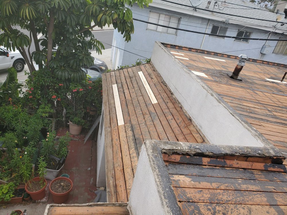 Slide of Trujano Roofing