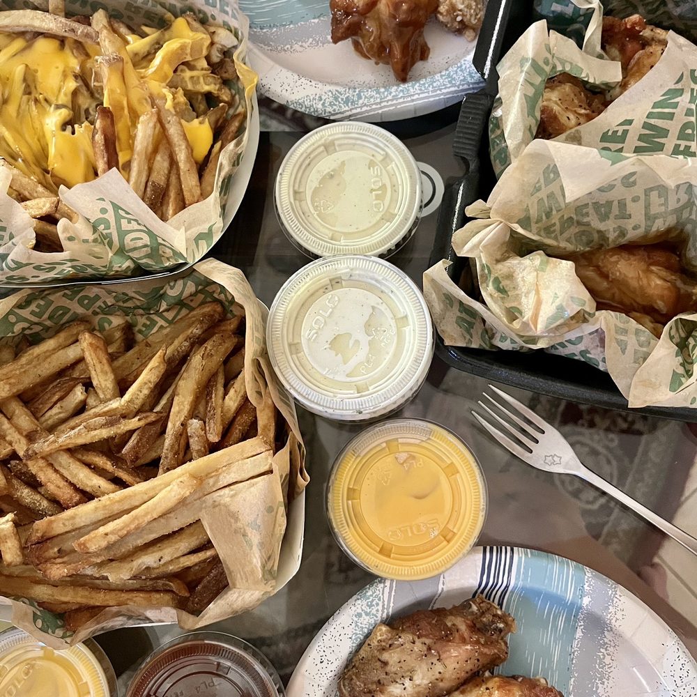 Wingstop - 2 Combos of 8 mixed wings with large cheese fries and extra dipping sauce. - Chicken Wings Near Me - Chula Vista, California