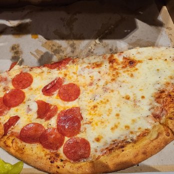 Vannucchi Brothers Pizza - What's left of a large extra cheese, half pepperoni pizza. The stuff of Ninja Turtles dreams! - Italian Near Me - Hollywood, Florida Vannucchi Brothers Pizza - What's left of a large extra cheese, half pepperoni pizza. The stuff of Ninja Turtles dreams! - Italian Near Me - Hollywood, Florida