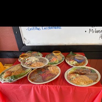 Sandia Mexican Restaurant - plates of food on a table - Mexican Near Me - San Antonio, Texas Sandia Mexican Restaurant - plates of food on a table - Mexican Near Me - San Antonio, Texas