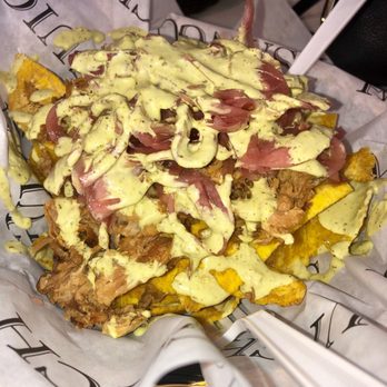 Sanguich - The Cuban Nachos!! That pork ! That sauce !!! - Cuban Near Me - Miami, Florida Sanguich - The Cuban Nachos!! That pork ! That sauce !!! - Cuban Near Me - Miami, Florida