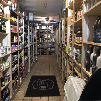 The Mansion - Wall to wall alcohol - New American Near Me - Melbourne, Florida