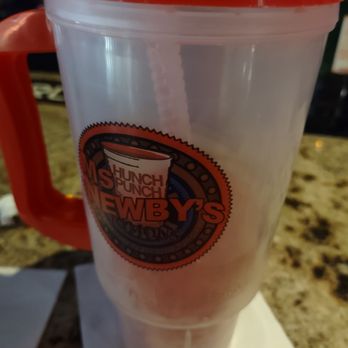 Ms Newby's Liquors - a drink in a plastic cup - Beer, Wine & Spirits Near Me - Panama City, Florida Ms Newby's Liquors - a drink in a plastic cup - Beer, Wine & Spirits Near Me - Panama City, Florida