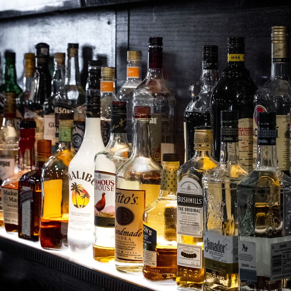 The Waltzing Weasel - a row of liquor bottles - Pubs Near Me - Oshawa, Ontario The Waltzing Weasel - a row of liquor bottles - Pubs Near Me - Oshawa, Ontario