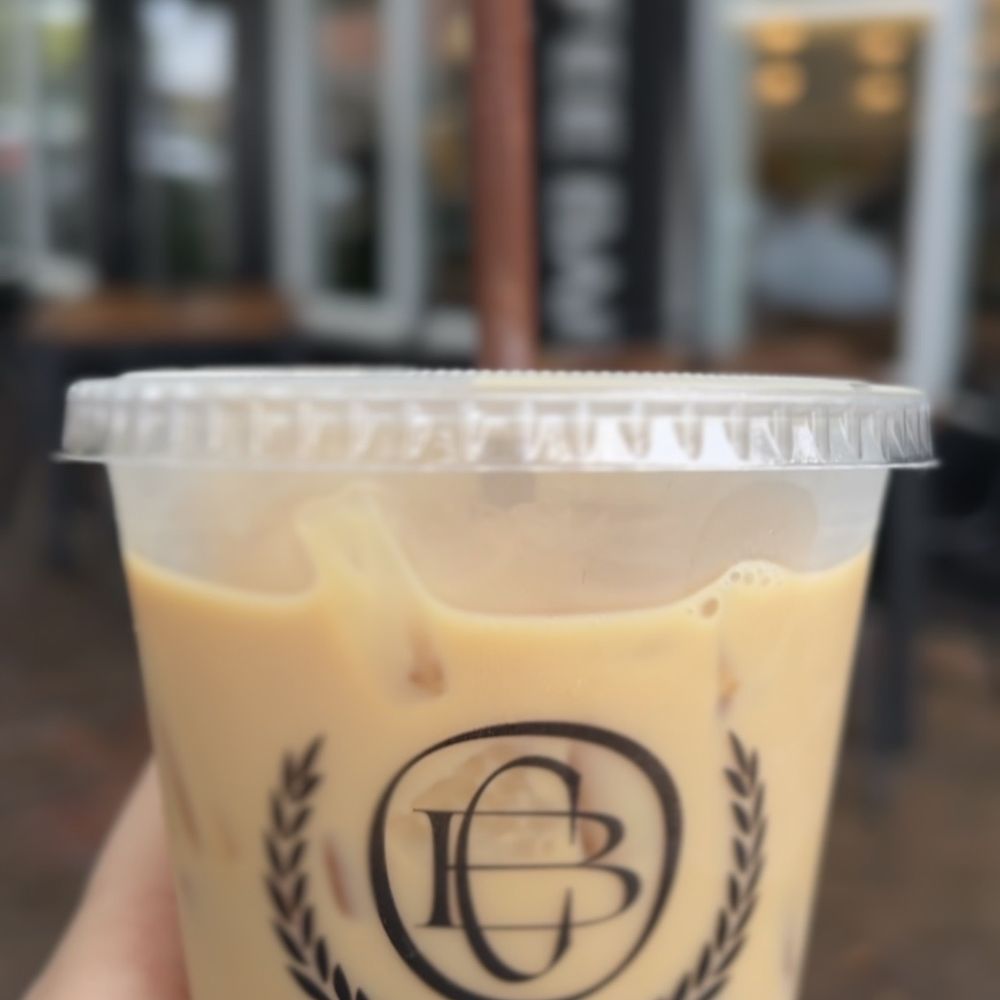 Origin Coffee Bar - Iced chai & exterior / front door of building - Coffee & Tea Near Me - Savannah, Georgia Origin Coffee Bar - Iced chai & exterior / front door of building - Coffee & Tea Near Me - Savannah, Georgia