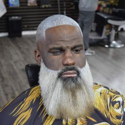 Fade Away Barber Shop - Skin fade with a beard line up